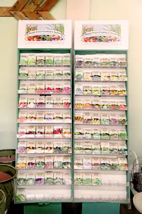 A tall rack of seed packets